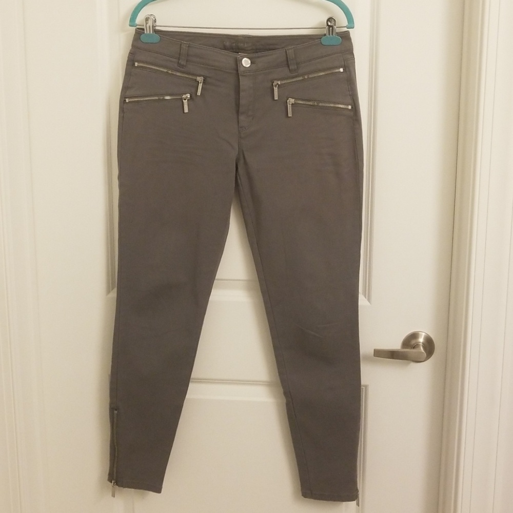 MK grey jeans with silver zipper detail
